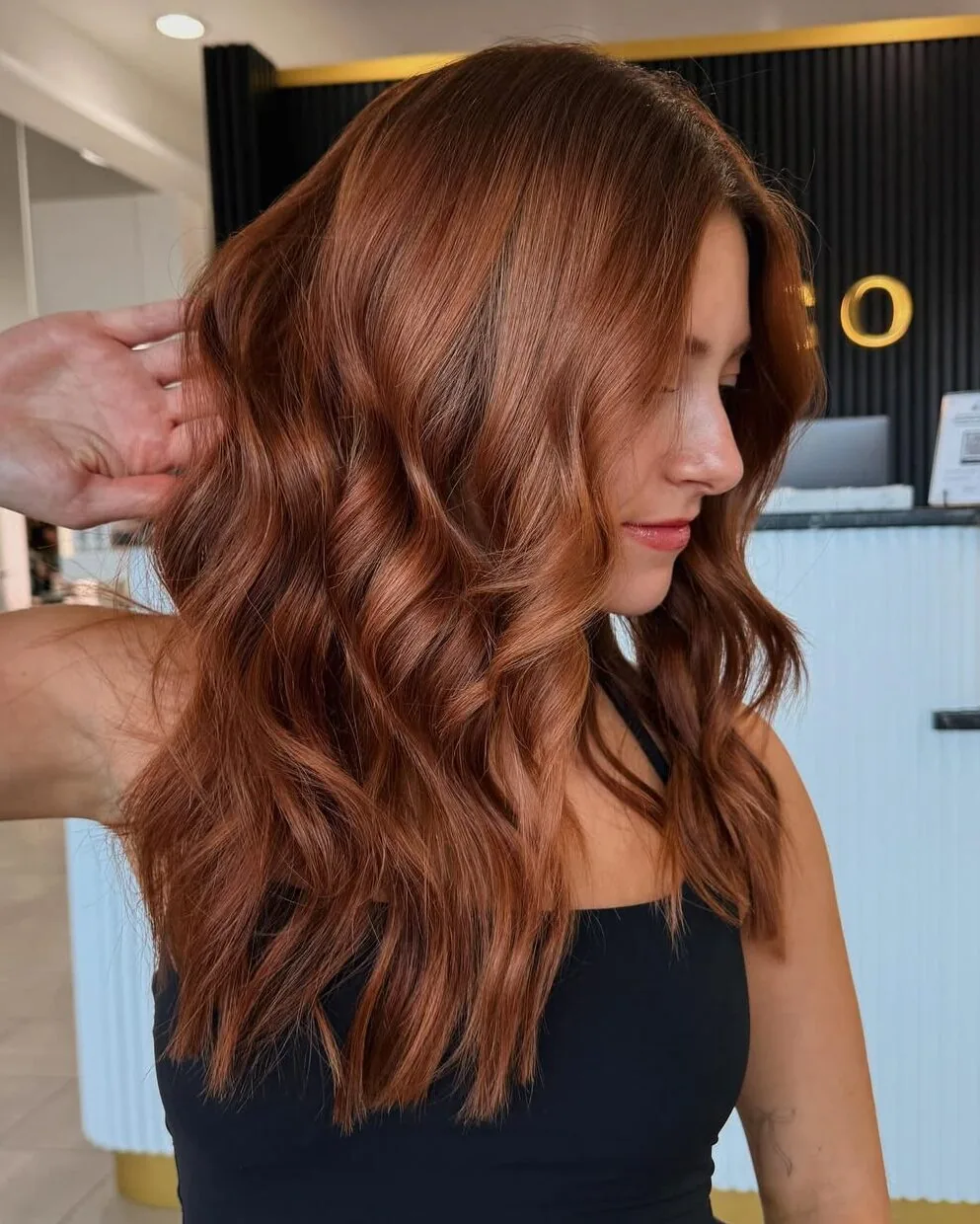 Cowboy copper hair color at Monaco Salon Tampa &mdash; warm amber and rust tones