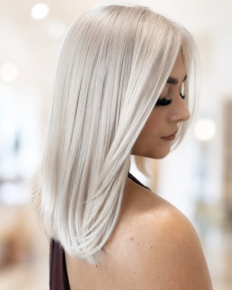 Platinum blonde lob haircut with color at Monaco Salon Tampa