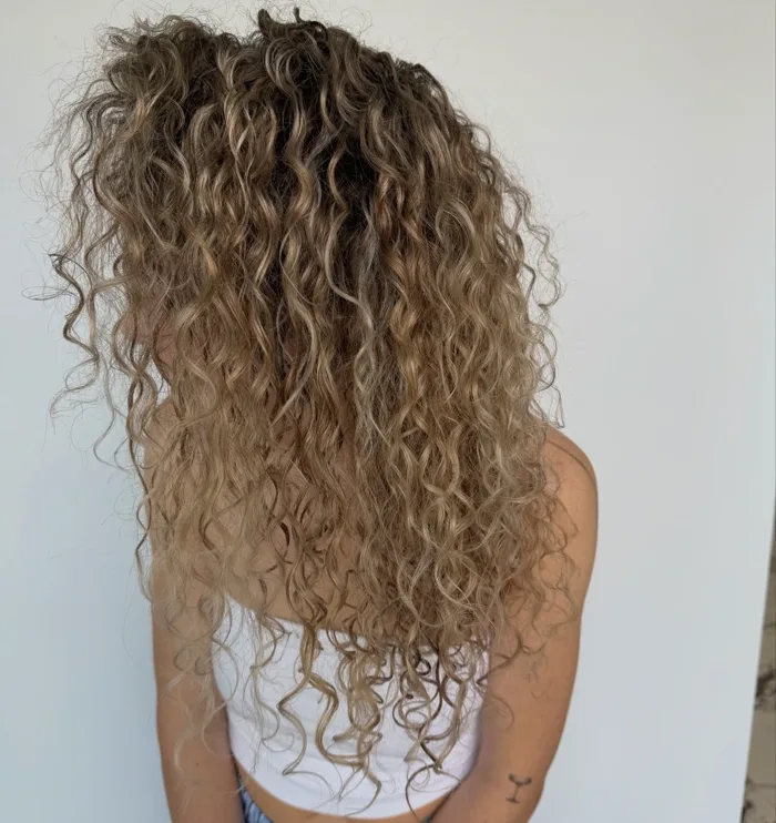 Curly textured cut with natural waves