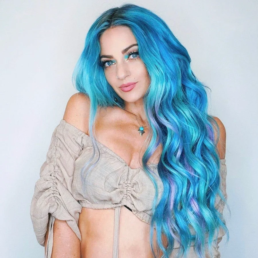 Ocean blue vivid hair color with lavender highlights at Monaco Salon Tampa
